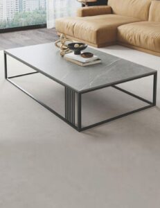 Rectangular grey stone coffee table top on a slim black metal frame