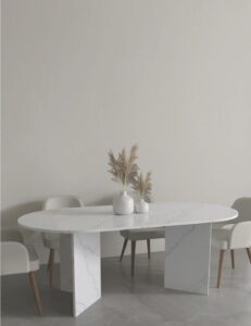 Oval white quartz dining table on two flat panel legs