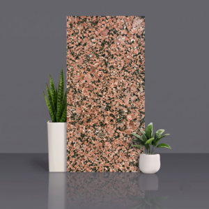 Polished pink granite slab with black, white and salmon mineral speckle