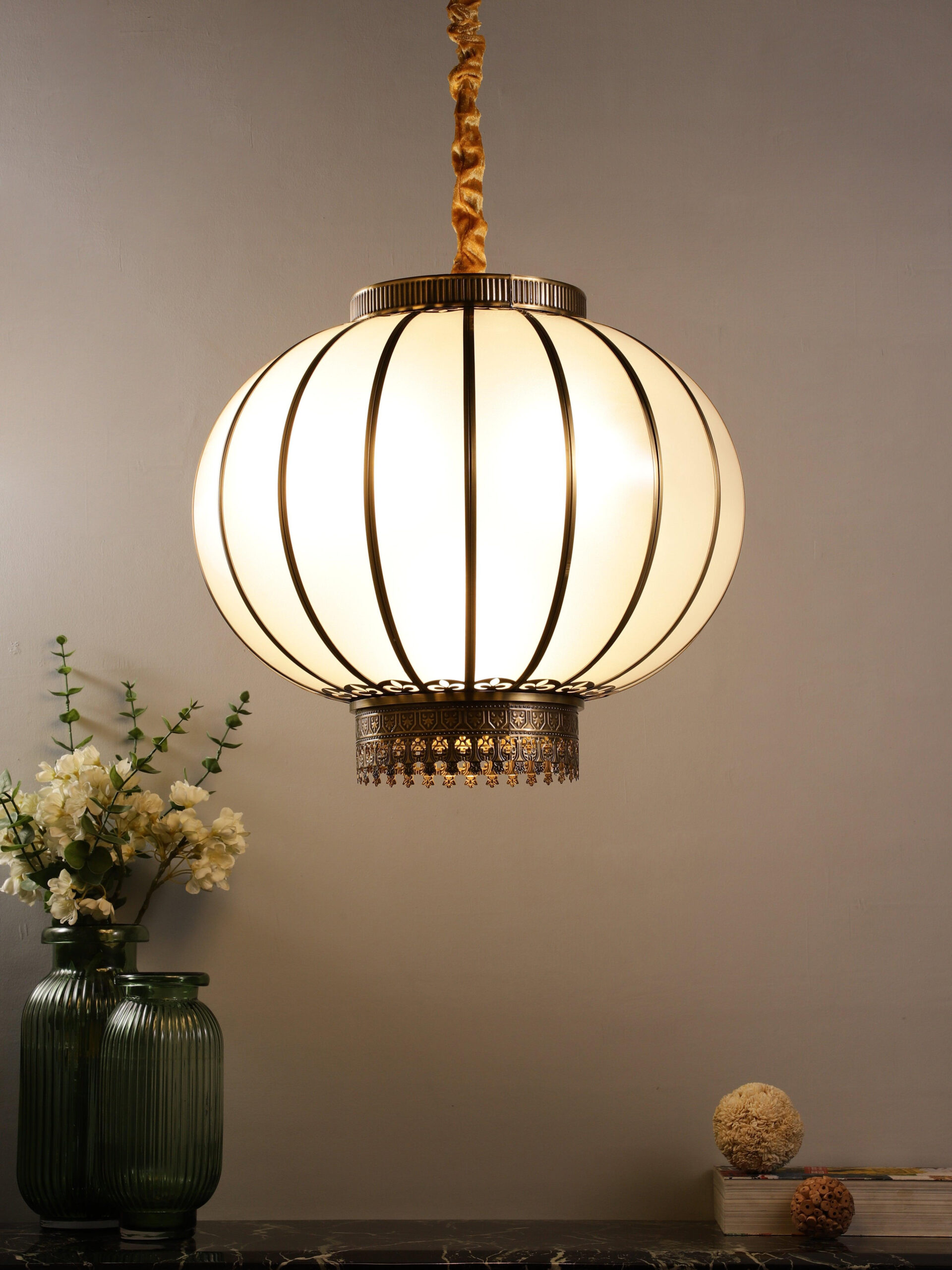 Brass framed globe lantern pendant with opal glass panels