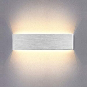 Brushed aluminium wall light washing light up and down the wall