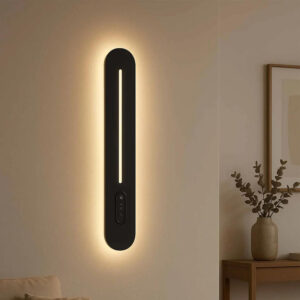 Slim black linear LED wall light with a lit central strip and backglow