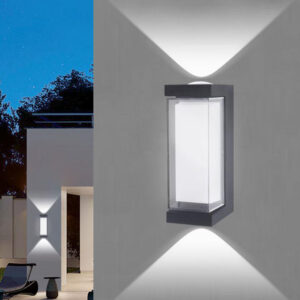 Rectangular outdoor wall light throwing narrow beams up and down an exterior wall